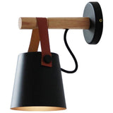 Applique-murale-coloris-noir-en-bois-avec-sangle