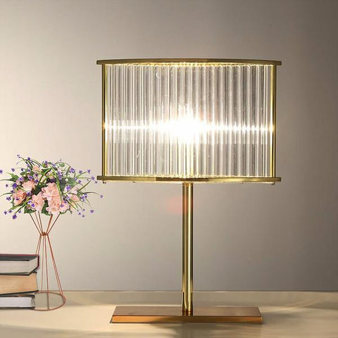 Lámpara de mesa moderna en cristal transparente y hierro forjado