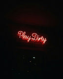 "Play dirty" neon light sign